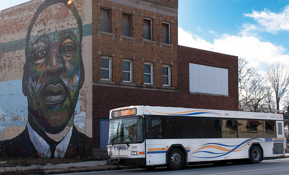 A depicting of a mural of Rosa Parks on the side of a TARTA bus.