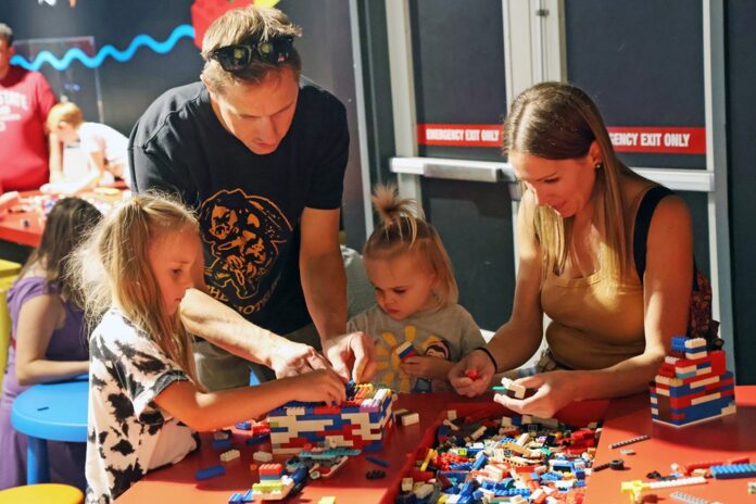 Matusek family playing with LEGO