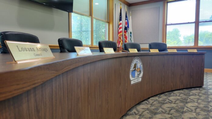 council chambers with artiaga sign